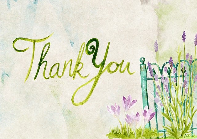 Thank you written in cursive by a painted gate with lavender flowers